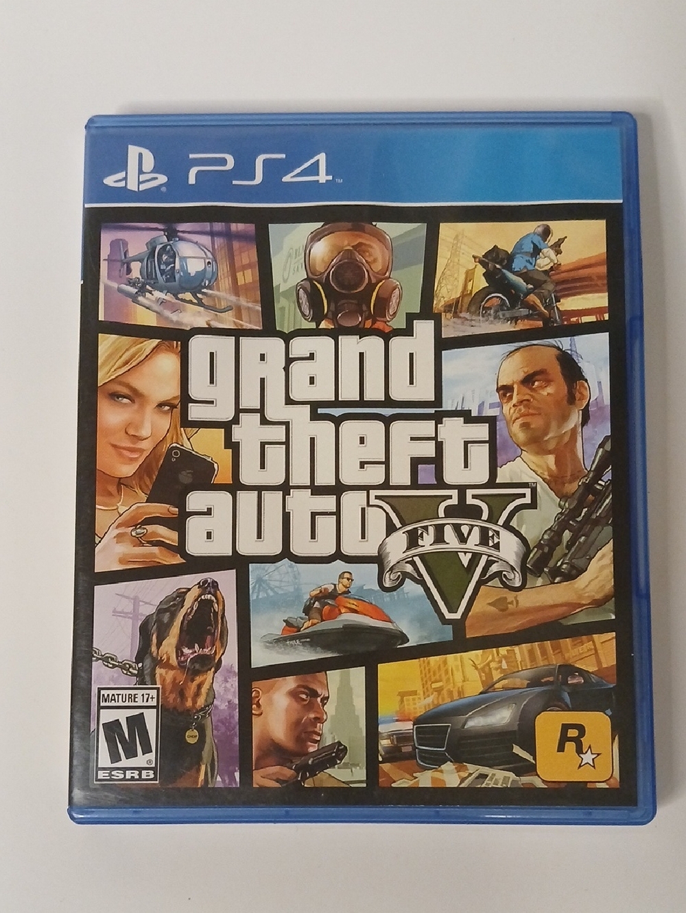 PS4 Grand Theft Auto V (Blue) - Rockstar Games